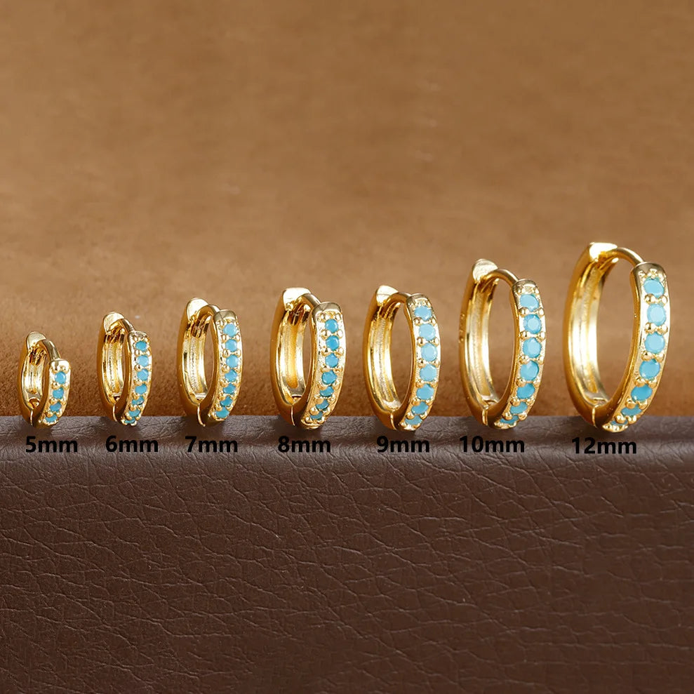 Celeste Spark Huggie Hoops