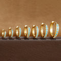 Celeste Spark Huggie Hoops